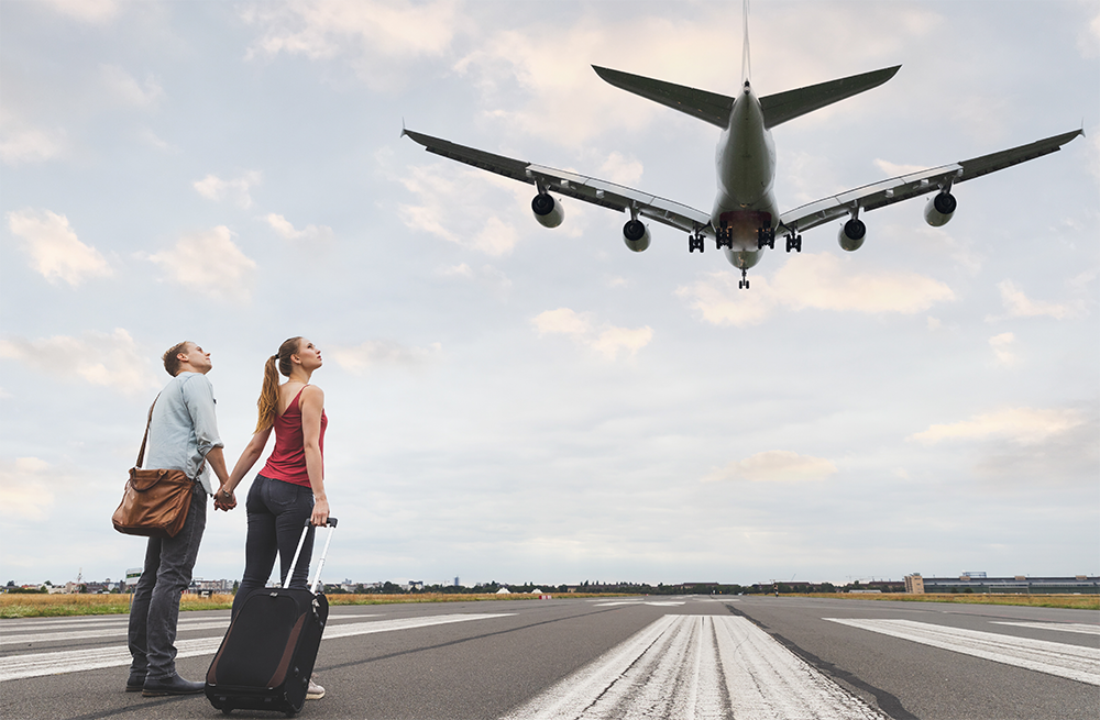 Happy Couple On Airport Runway With Plane Landing 2025 01 07 12 12 21 Utc - Barão Assessoria Contábil